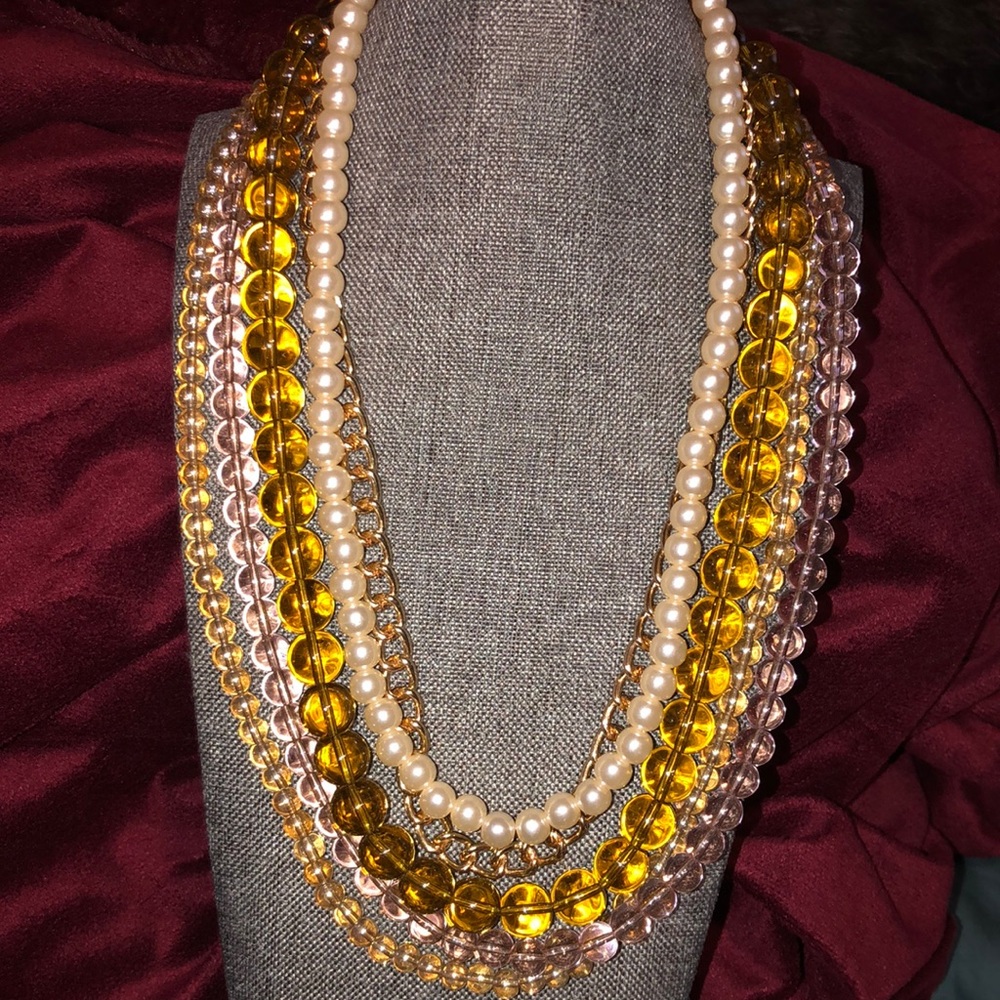 Beautiful multilayered beaded necklace.   Honey amber and faux pearls 5 layered